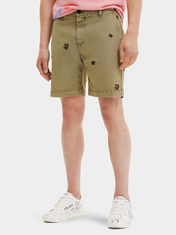 Shorts in green color with embroideries - 1
