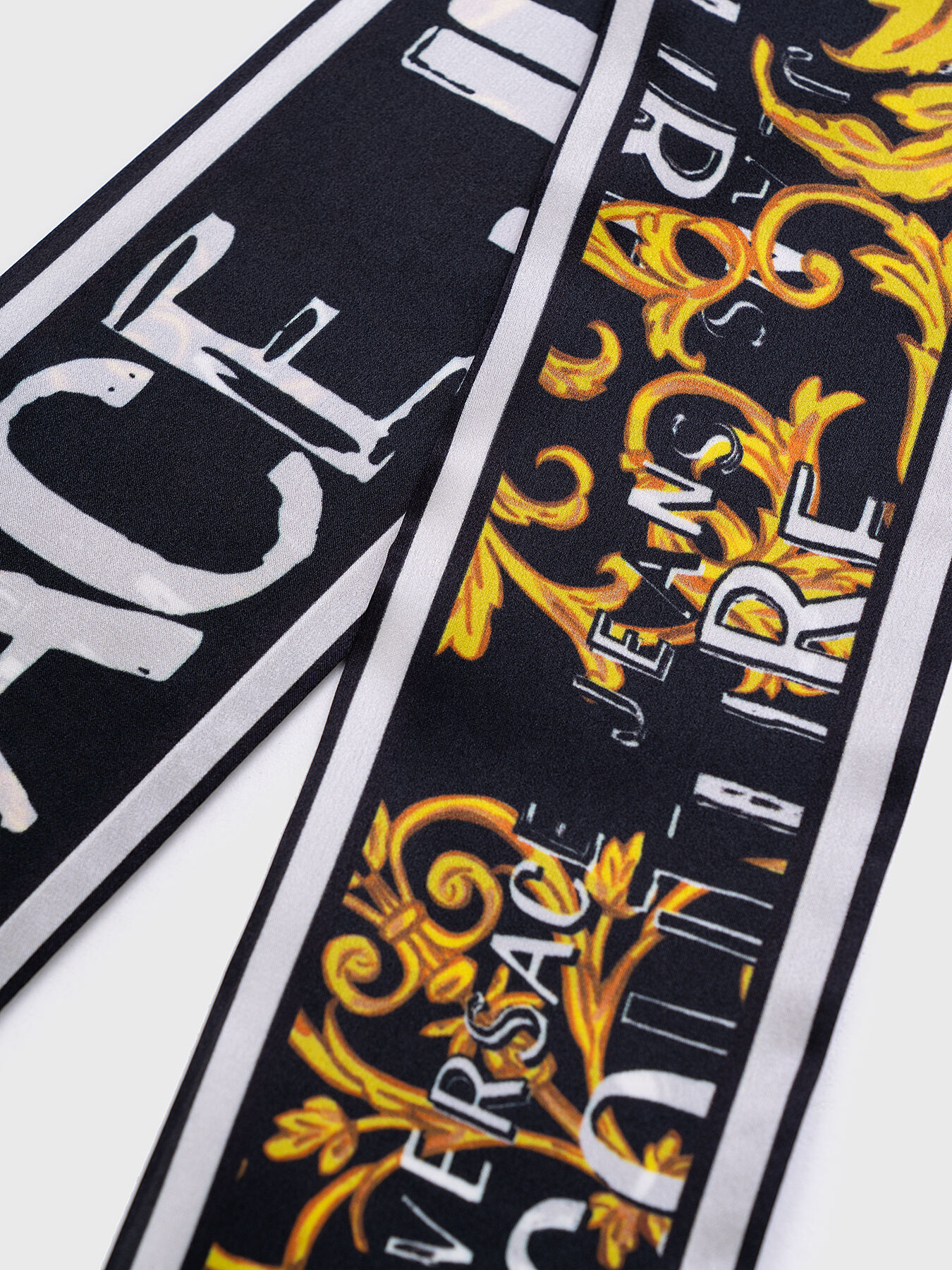 Black scarf with contrasting logo accents brand VERSACE