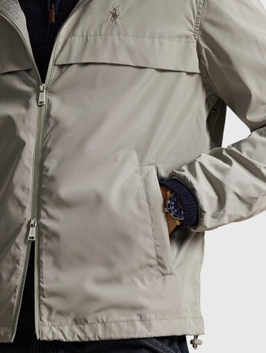 Hooded jacket with a double zip - 5