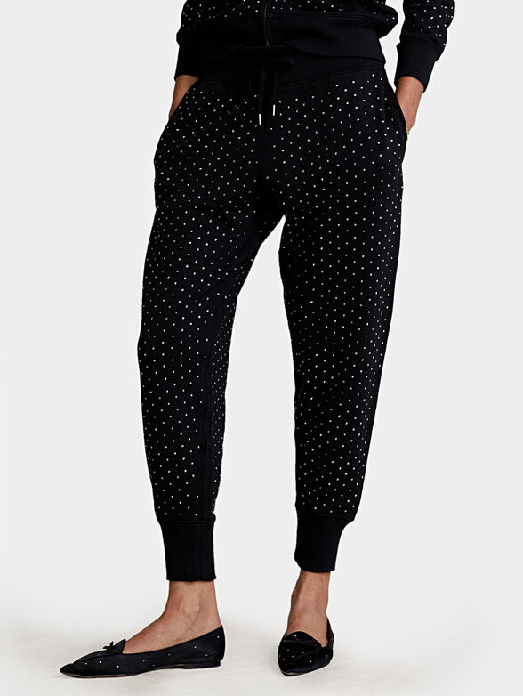 Sports pants with appliqued rhinestones - 1
