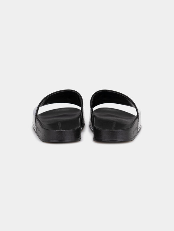 Slides in black with logo detail - 3