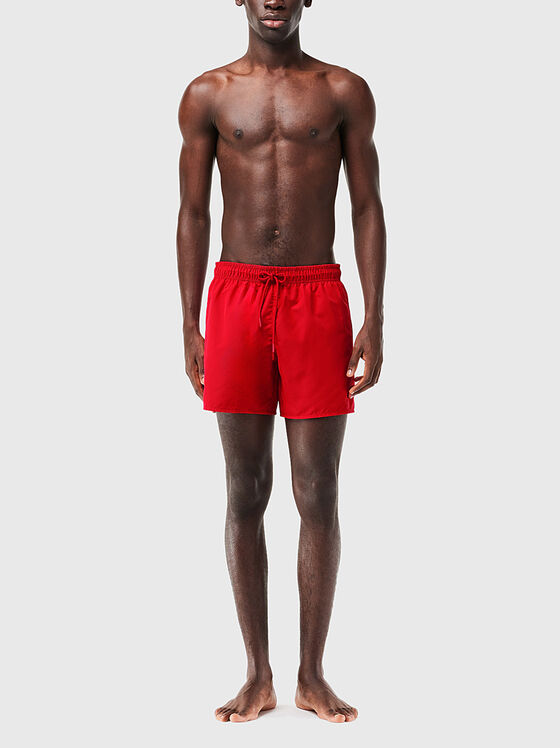 Yellow shorts with logo detail - 1