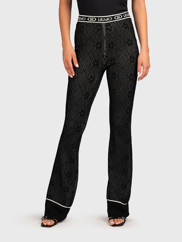 Sports pants with floral print and logo - 1