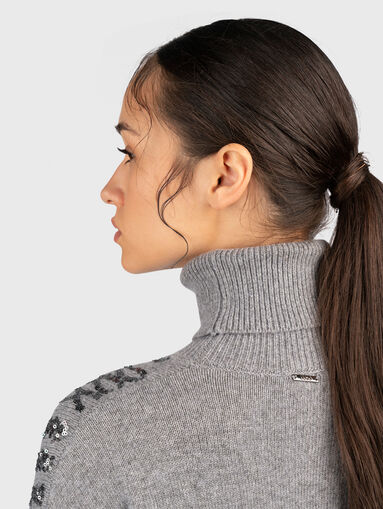 Black dress with sequins and polo collar - 5