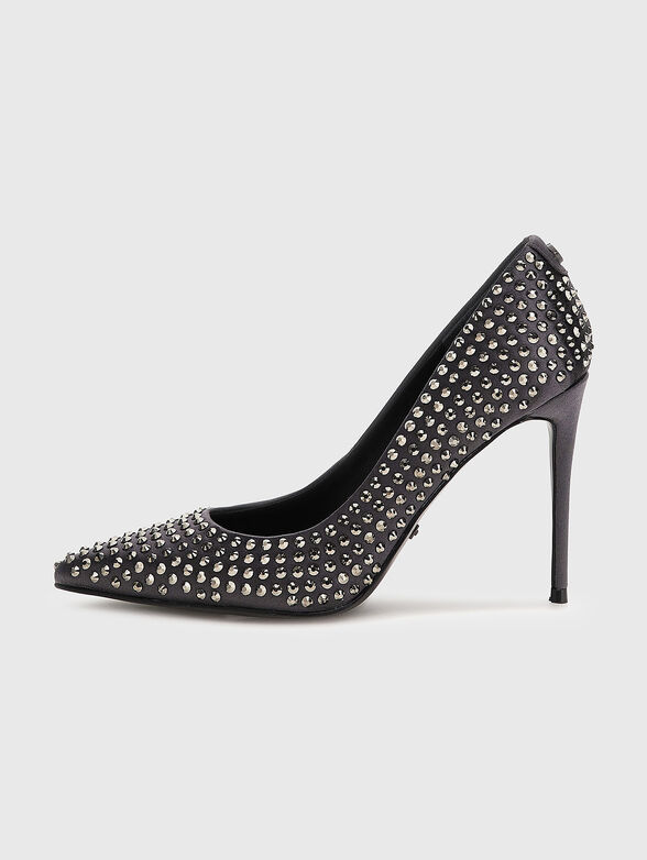 Heeled shoes with appliquéd eyelets  - 1