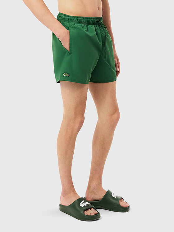 Плажни шорти в зелен цвят - 1