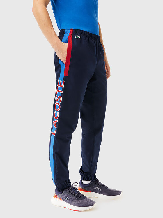 Спортен панталон с контрастен лого принт - 1