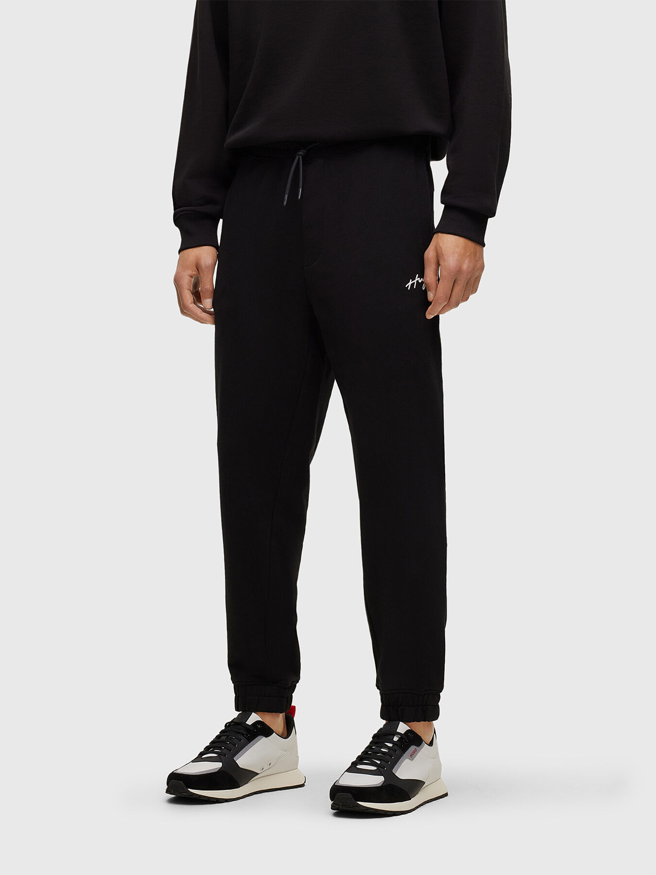 Black cotton sports trousers brand HUGO Globalbrandsstore en
