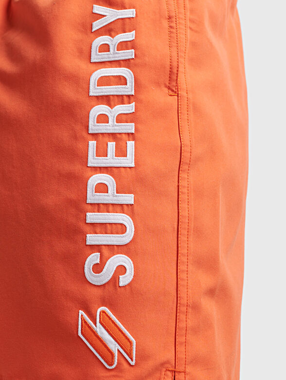 Beach shorts in black color - 5