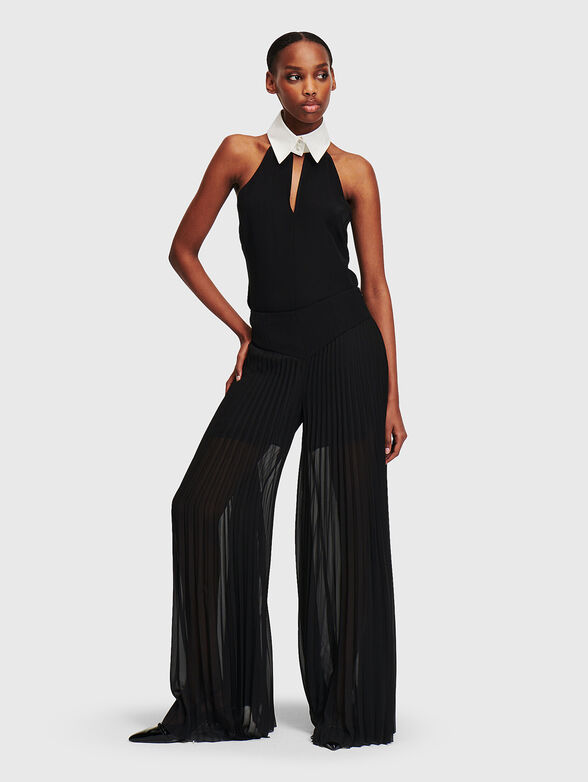 Pleated trousers with sheer effect - 1