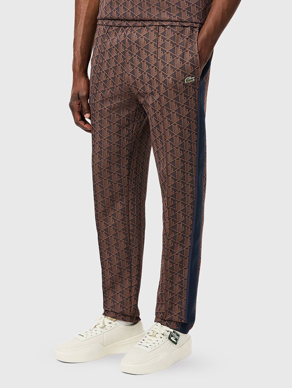 Brown sports trouser with monogram print - 1