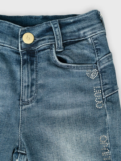 Jeans with rhinestone logo - 2