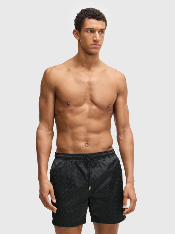 Beach shorts with monogram logo print - 1