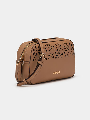 Black crossbody bag with laser perforations - 4