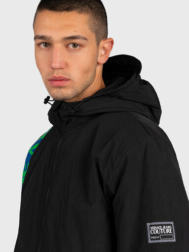Sports jacket with zipper and hood - 3