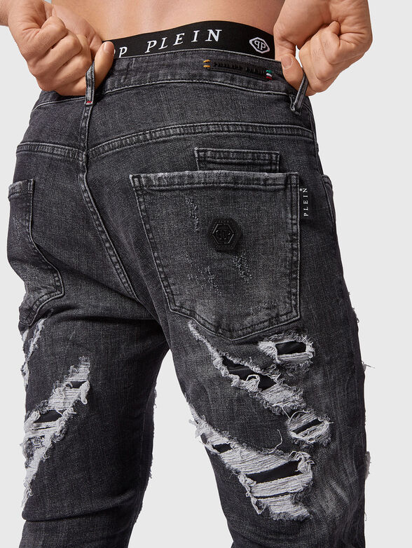 Slim jeans with ripped accents - 3
