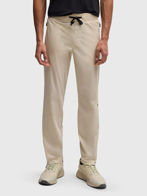 Sport trousers with an accent zip and logo - 1