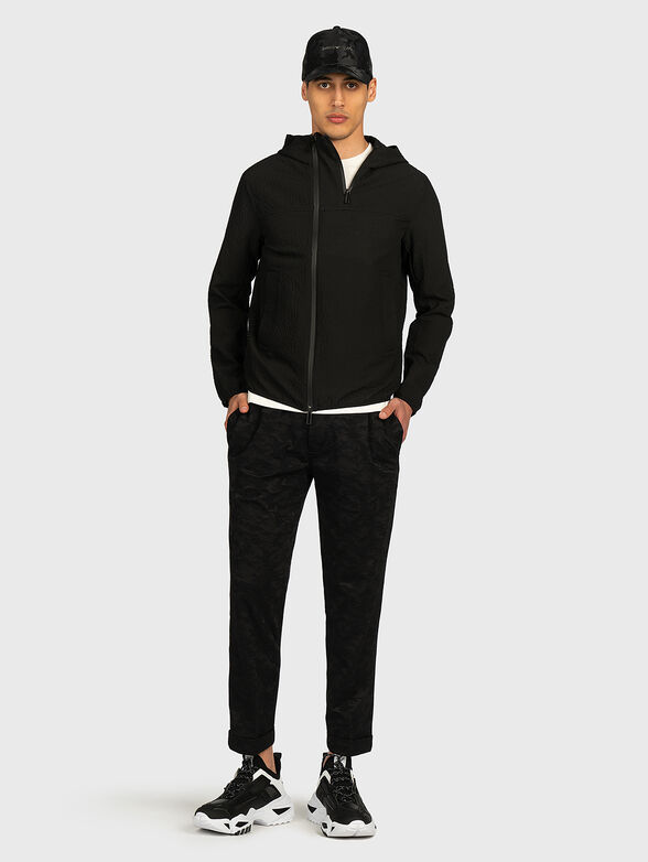 Jacket with an asymmetrical fastening - 5