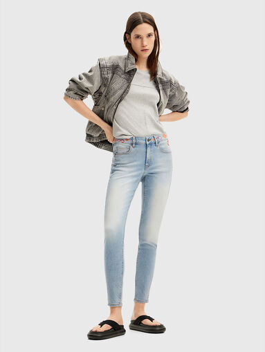 Skinny jeans with floral embroideries - 5