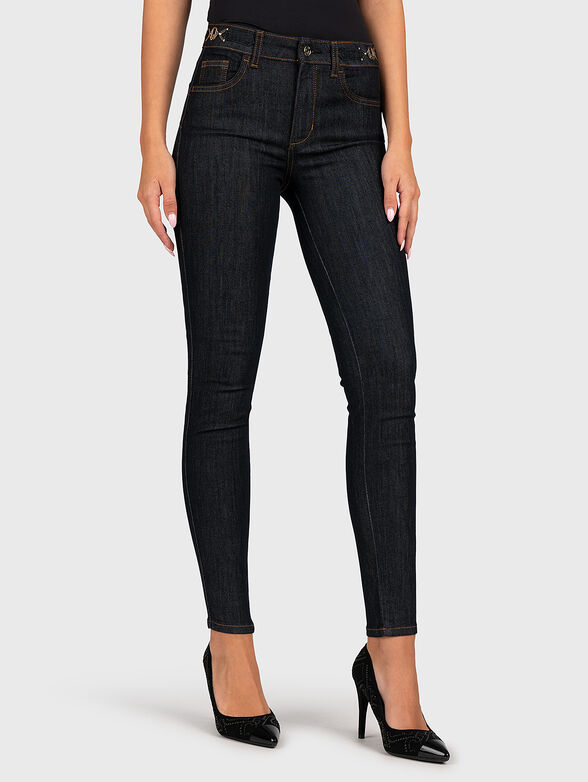 Dark blue jeans with metal details - 1