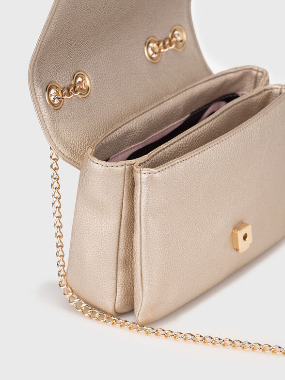 Gold bag with monogram logo texture - 6