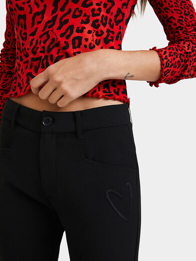 Trousers with embroidered details - 5