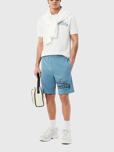 Cotton shorts with logo print in ecru - 5