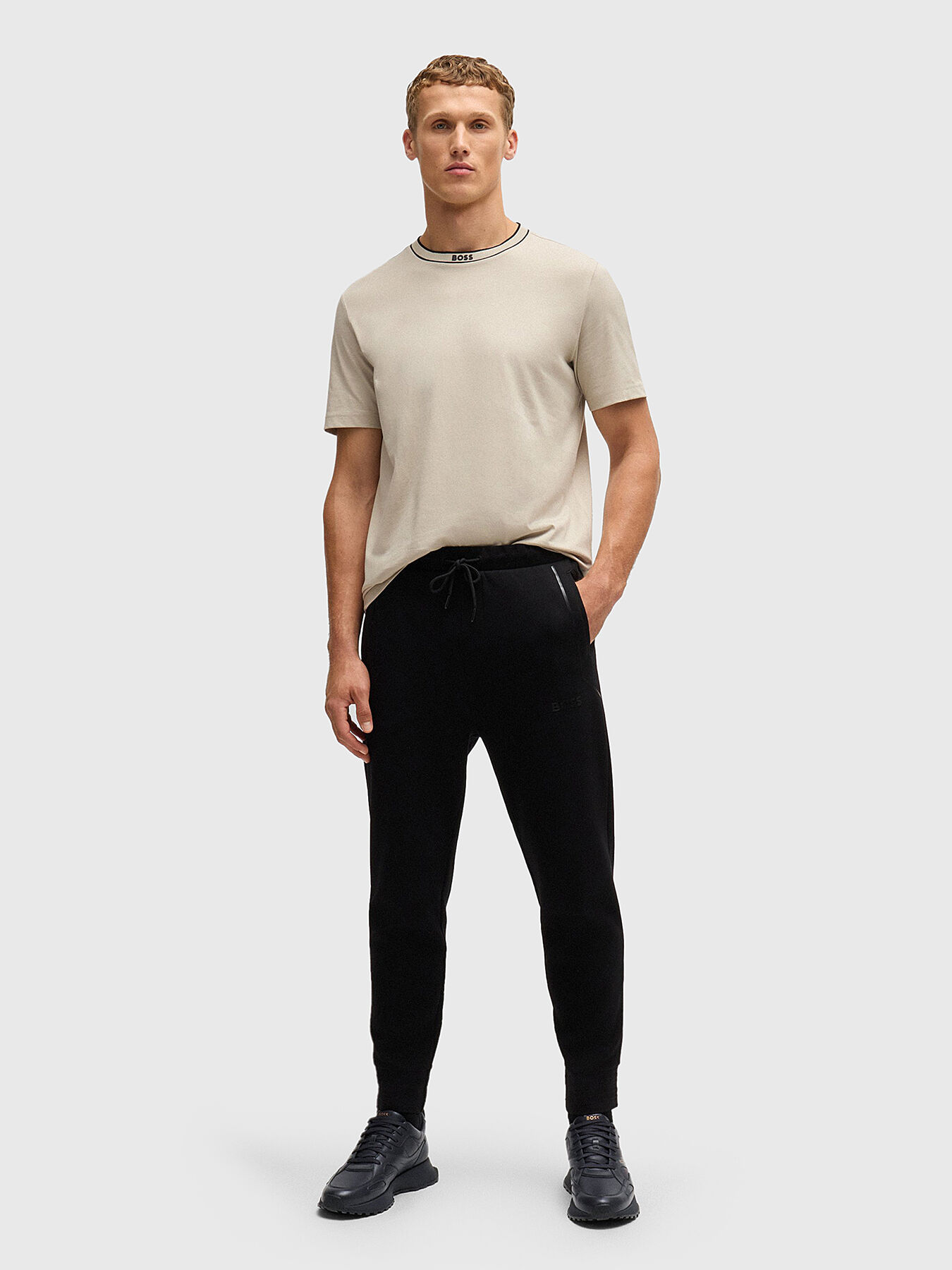 BOSS ブラックスラックス BOSS - Cuffed tracksuit bottoms in active-stretch fabric - Black