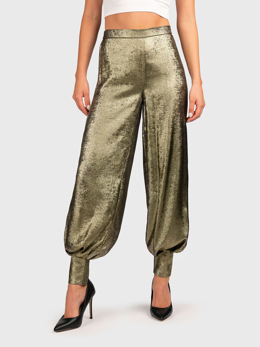 Golden trousers with wide legs