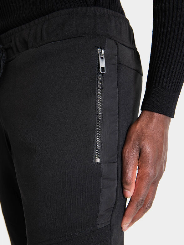 Sports pants with zippers - 4