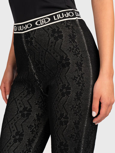 Sports pants with floral print and logo - 4