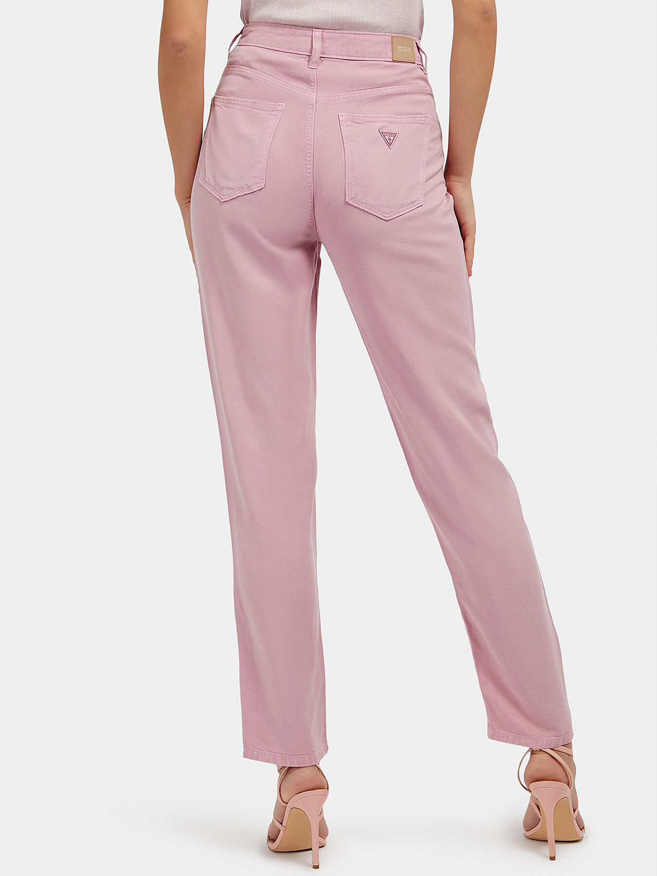 Pink jeans with logo detail brand GUESS Globalbrandsstore en