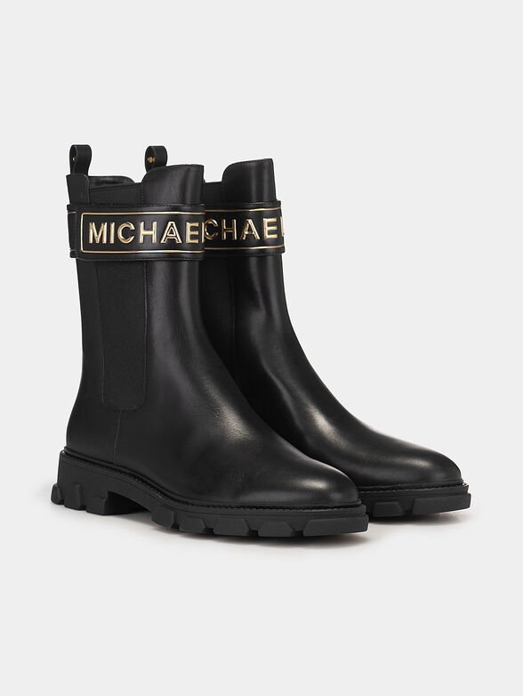Black leather ankle boots with golden logo  - 2