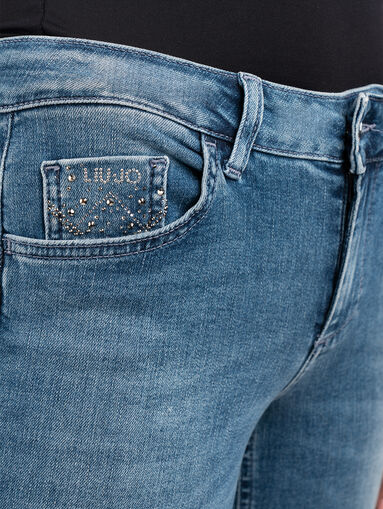 Skinny jeans with appliqued logo - 4