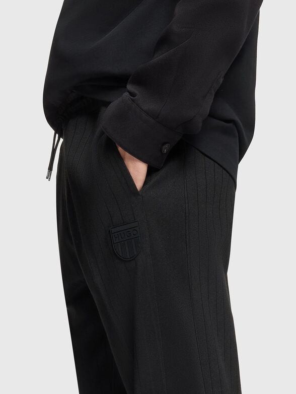 Trousers with elastic waist and logo patch - 3