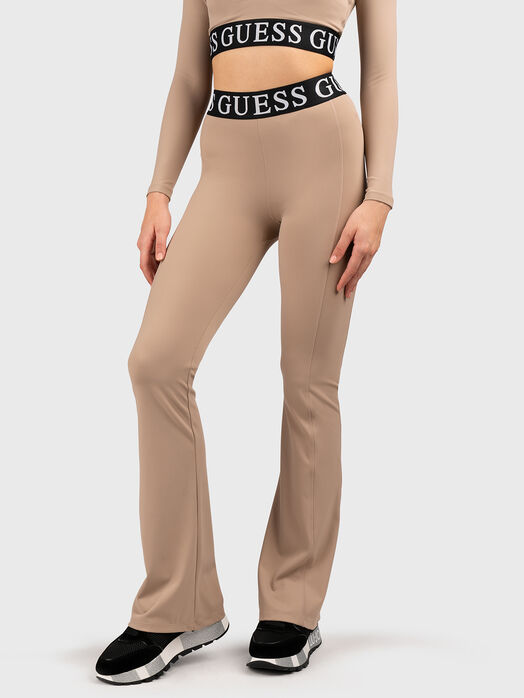 Beige sports trousers with logo details