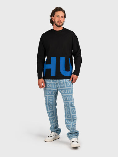 NATE jeans with monogram print - 5