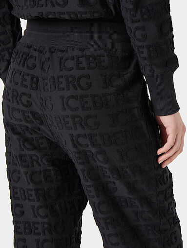 Pants with embossed logo texture - 3