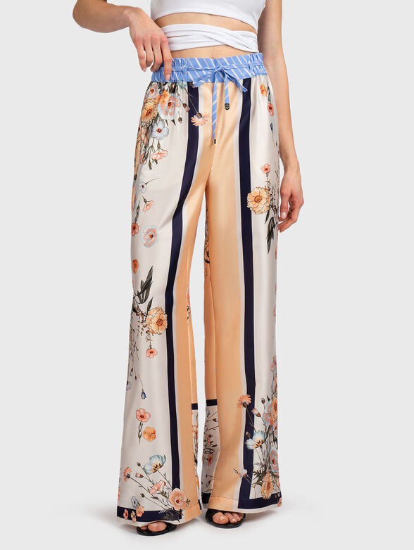 Floral print trousers - 1