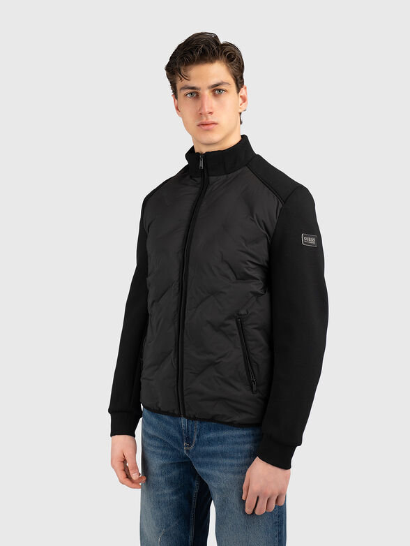 Black jacket with a quilted effect - 1