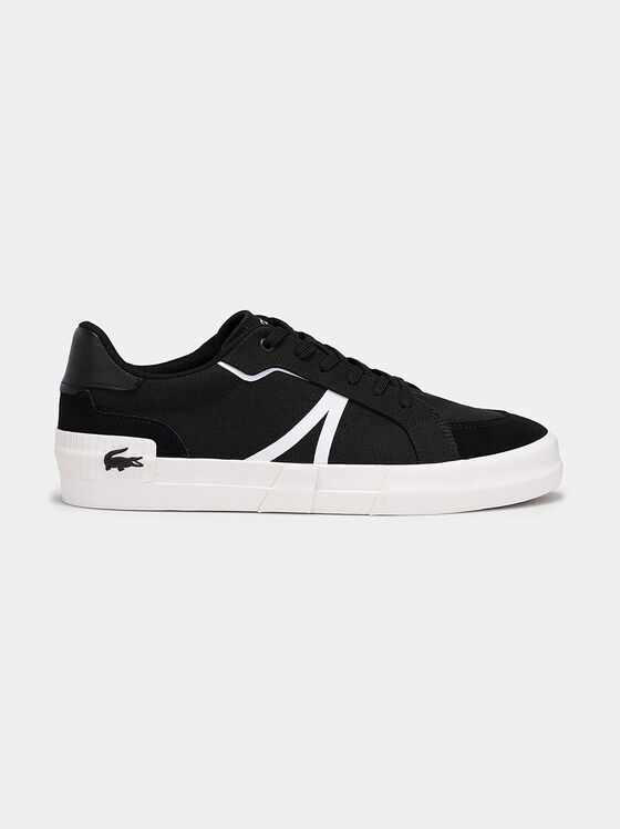 Black sneakers with laces and white accents - 1