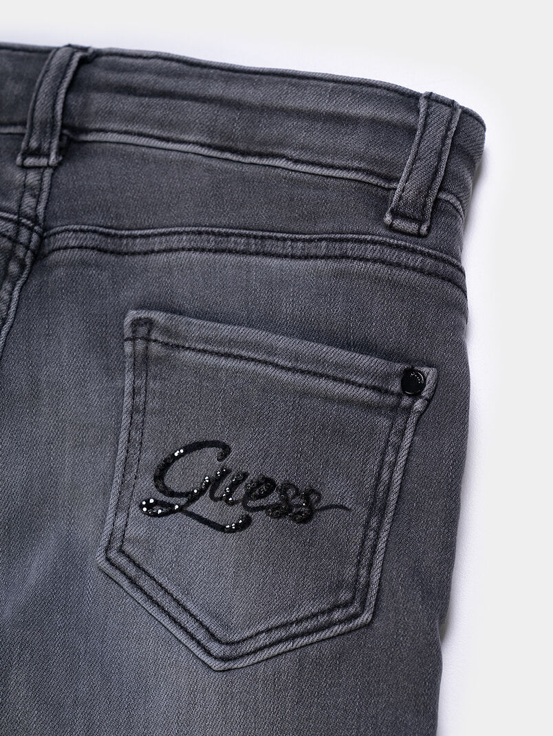 Jeans with washed effect and shiny applications - 3