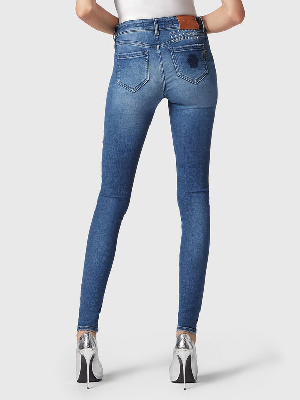 Skinny blue jeans with ripped details - 1