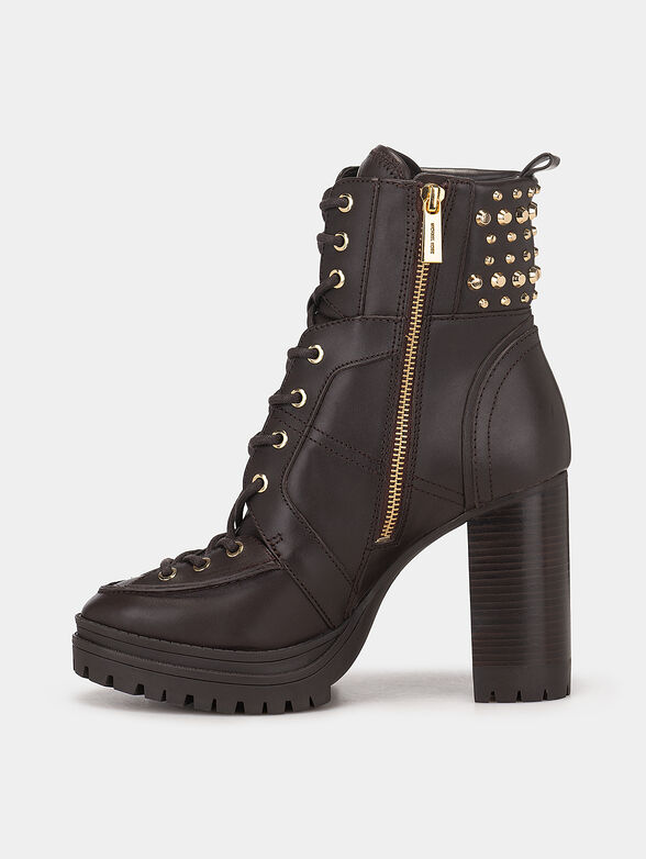 Leather boots accented with appliqued eyelets - 4