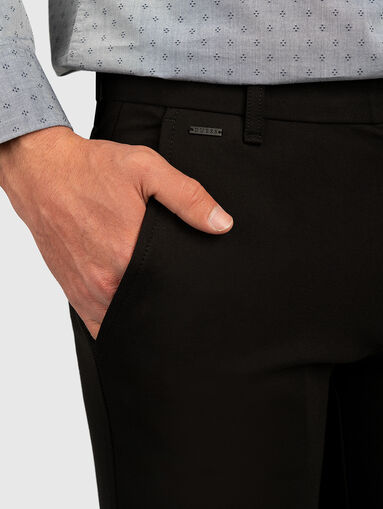 MYRON Slim trousers in black color - 3