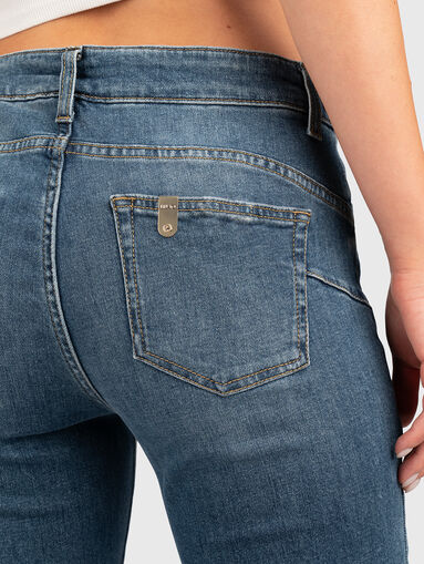 Jeans with logo accents at the waist - 4