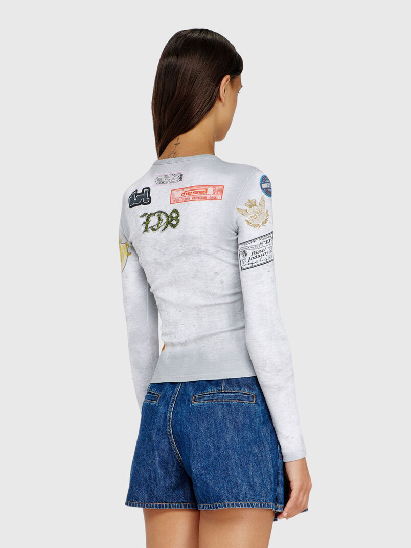 Long-sleeved blouse with appliqu&eacute;s - 3
