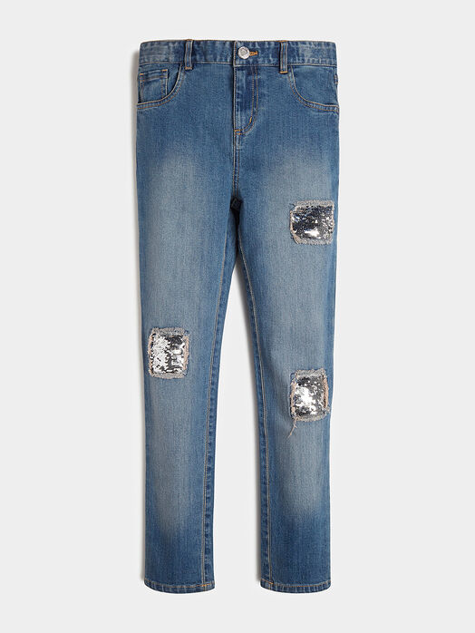 Jeans with reversible sequins 