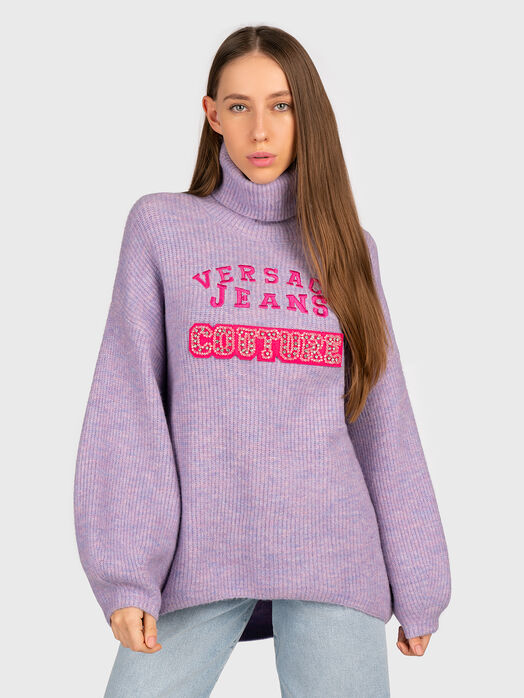 Purple sweater with rhinestones