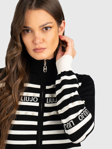 Vest with zip and logo accents - 4